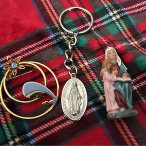 Keepsake Mary religious items including brooch pin, , key chain and figurine.